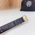 Navy leather belt with gold square buckle and rows of metal strap holes