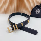 Dark blue leather belt with gold buckle, vertical charm ornaments, and stud holes