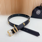 Navy leather belt with gold buckle, cross studs, and decorative metal links