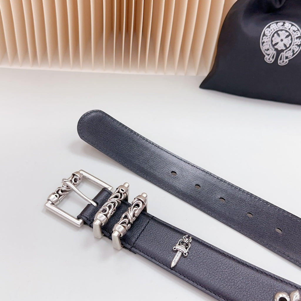 Dark leather belt strap with perforation holes and chrome buckle hardware
