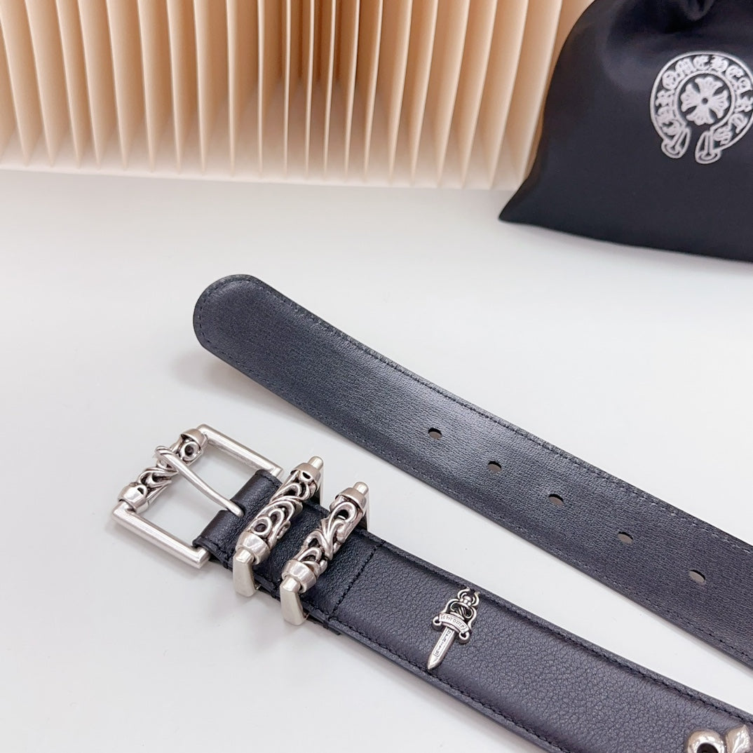 Dark leather belt strap with perforation holes and chrome buckle hardware