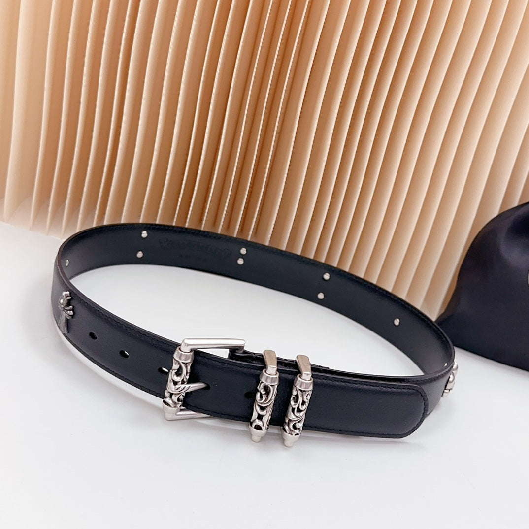 Dark leather belt with chrome buckle, chain charms, and metal studs