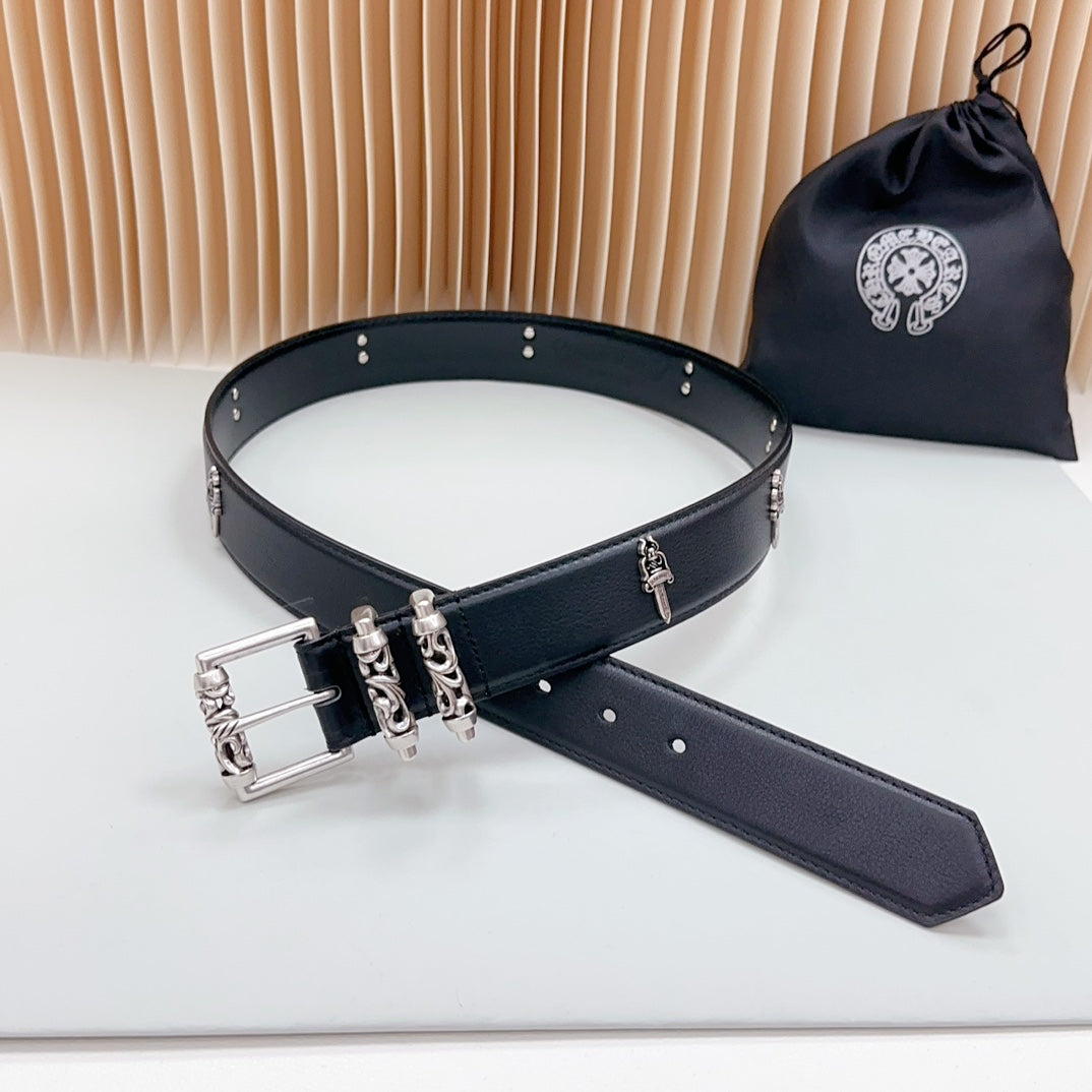 Chrome-buckle belt with dark strap, decorative rings, and grommet-style hole rows