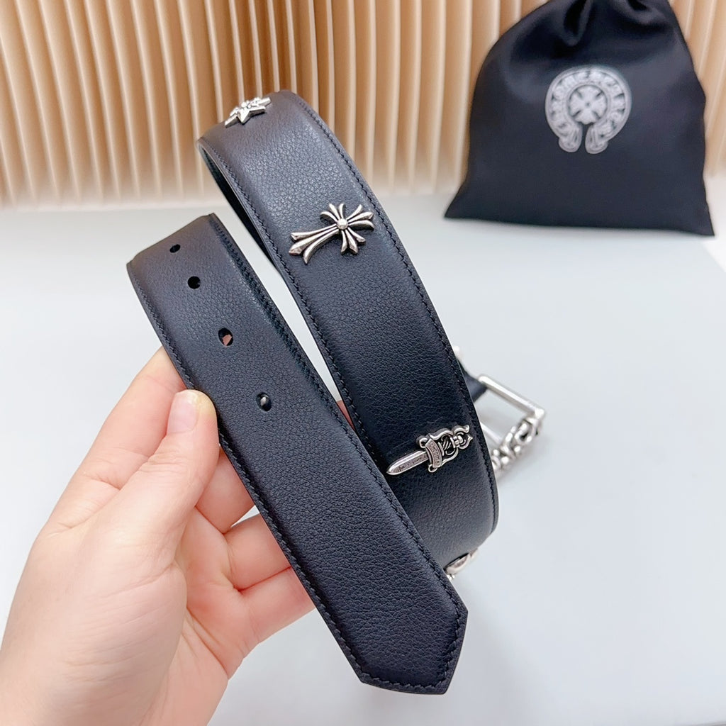 Chrome belt side view with silver star charm and small pinholes on dark leather strap