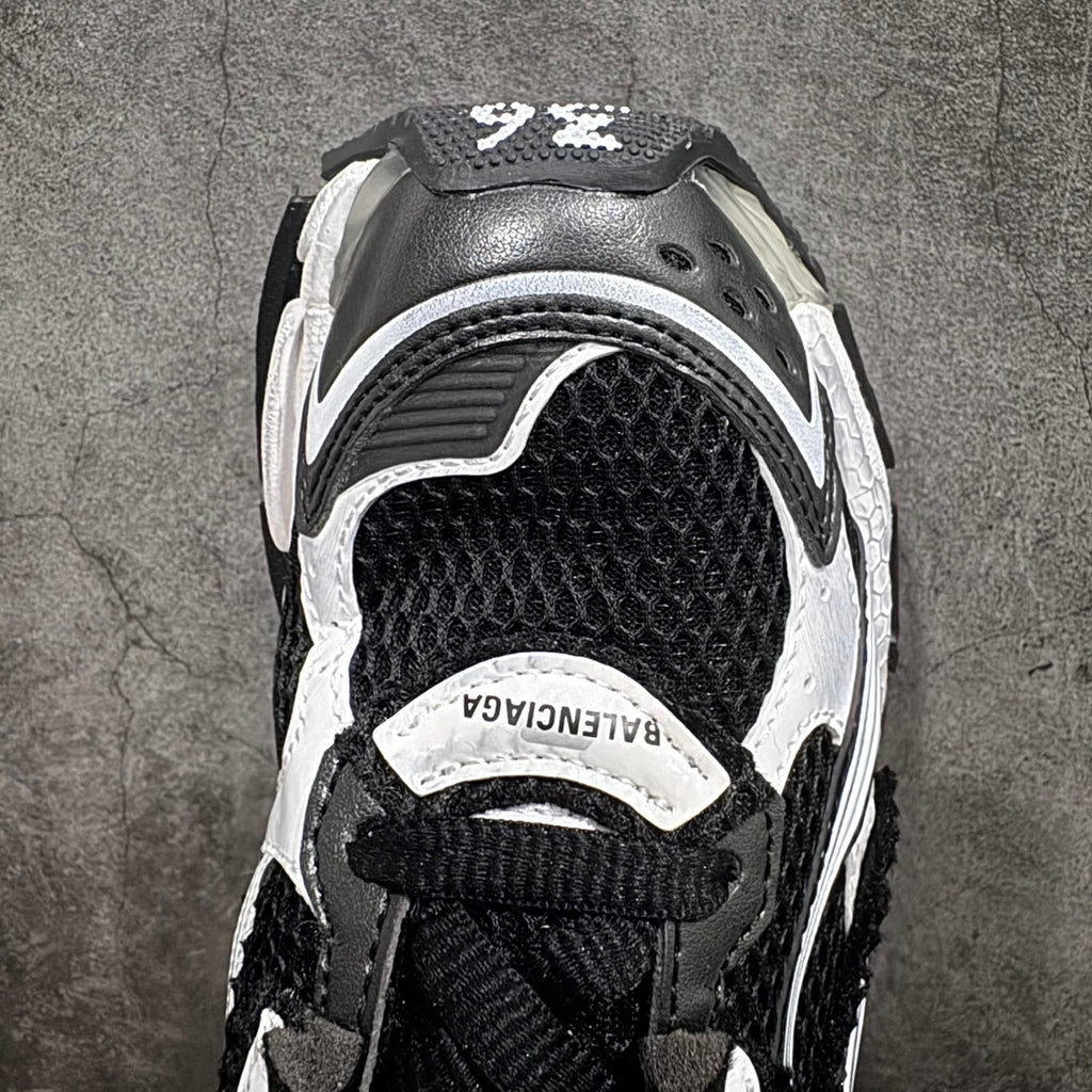 Unisex sneakers inner side view with mesh and leather details, BALENCIAGA label.