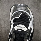 Unisex sneakers inner side view with mesh and leather details, BALENCIAGA label.