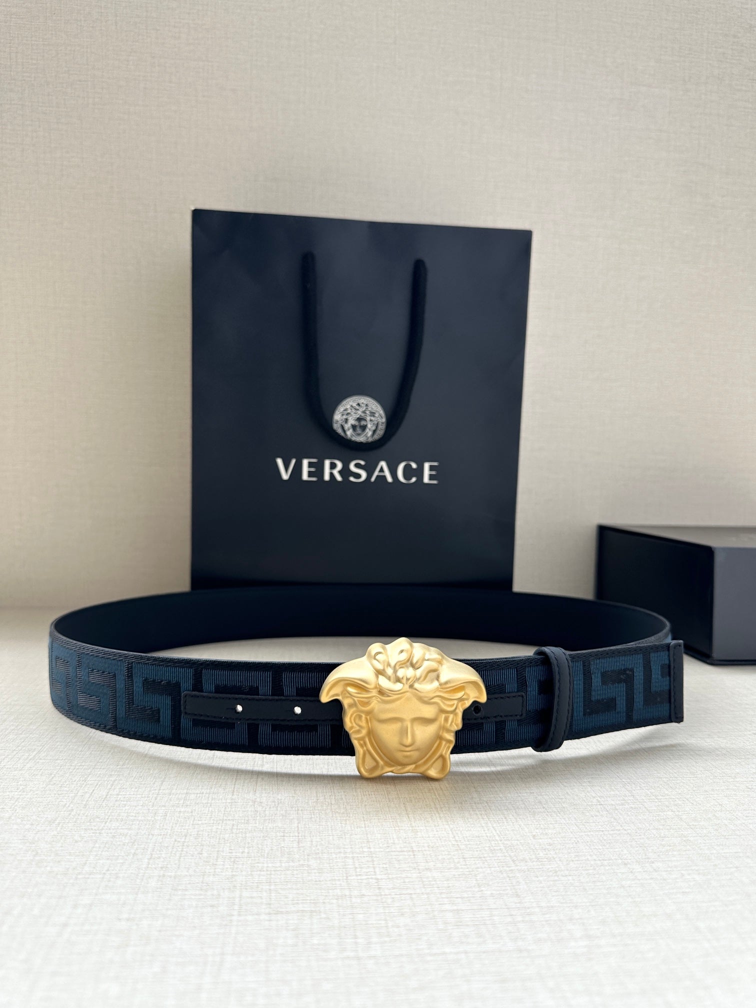 Versace belt in dark blue with Greca pattern and gold Medusa buckle