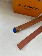 Tan leather belt end with silver LV buckle and blue keeper tab