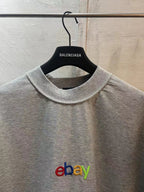 Heather gray short-sleeve T-shirt close-up, crew neck with eBay multicolor logo
