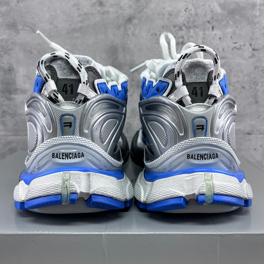 Balenciaga unisex sneakers rear view with BALENCIAGA logo and blue midsole