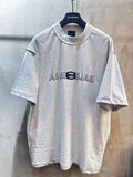 Light gray Balenciaga short-sleeve T-shirt with crew neck and front logo graphic