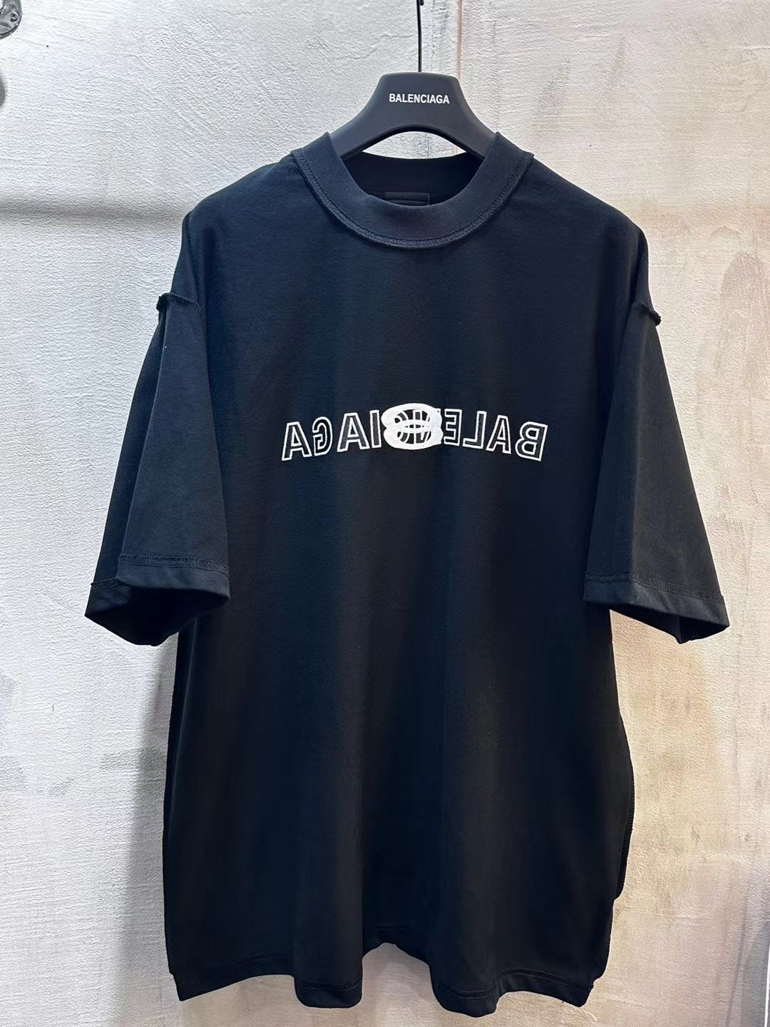 Dark navy Balenciaga short-sleeve T-shirt with crew neck and front logo graphic