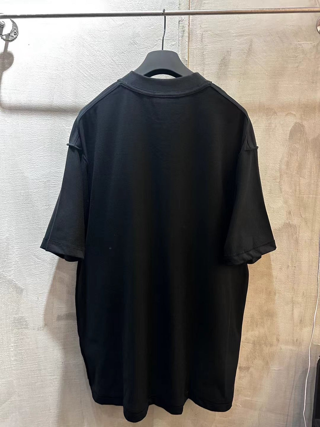 Dark navy Balenciaga short-sleeve T-shirt back view with crew neck