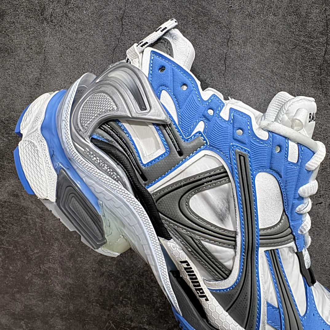 Balenciaga unisex sneakers, three-quarter view, white laces, blue upper, silver midsole
