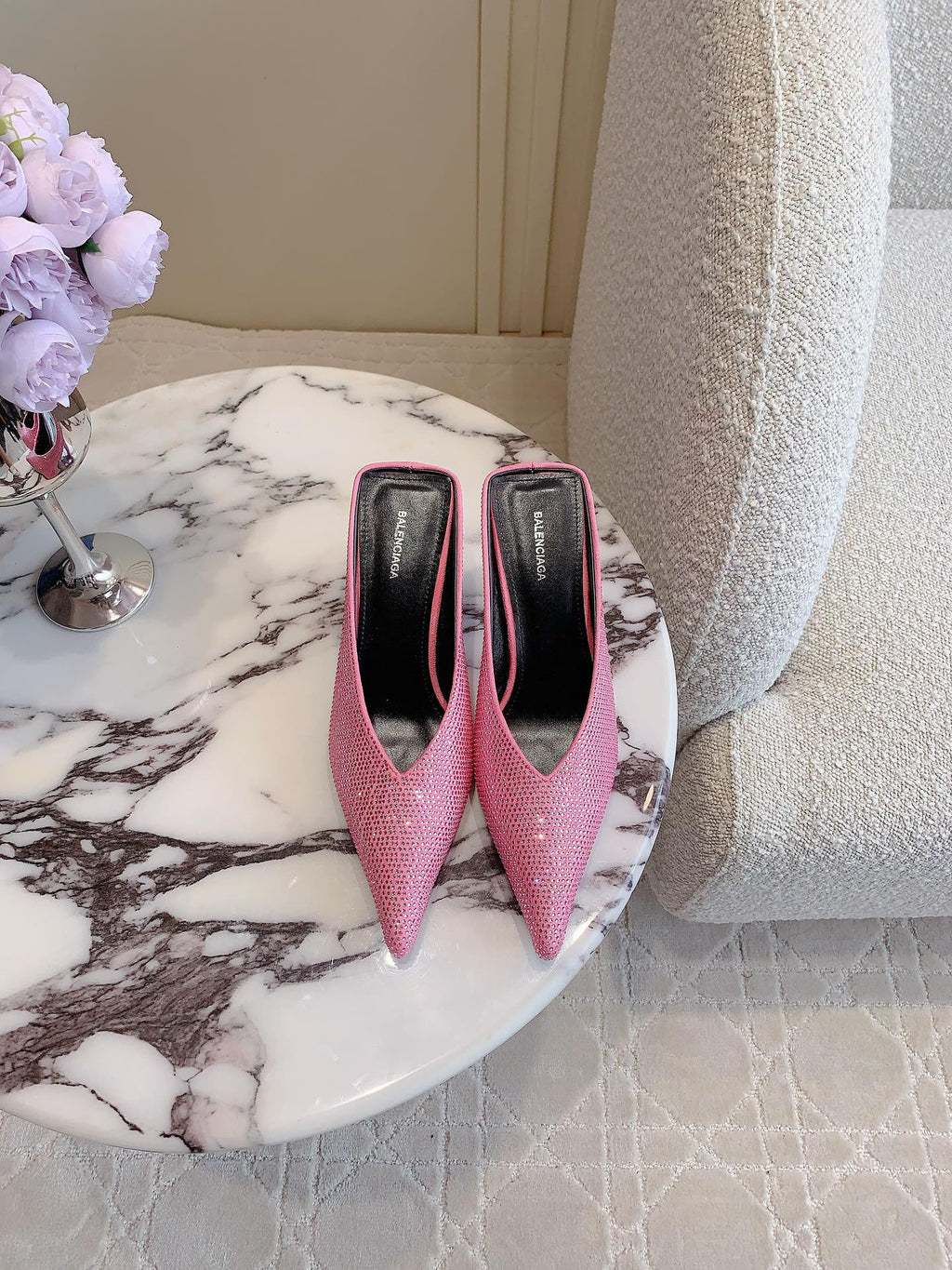 Pink crystal-embellished pointed-toe mules with thin stiletto heel, side view