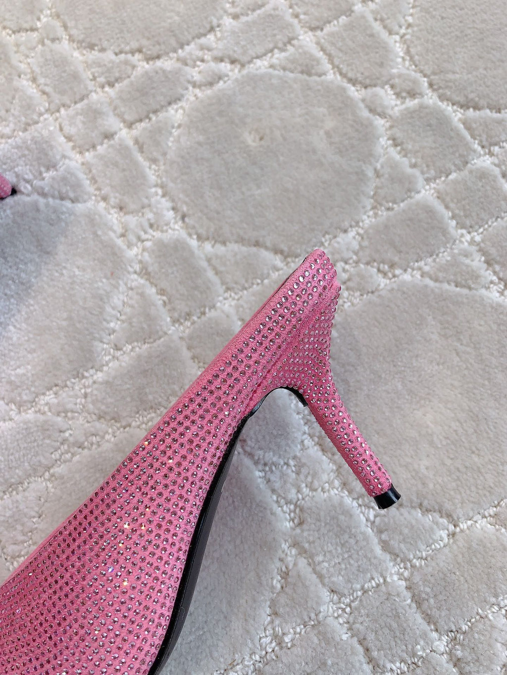 Pink crystal-embellished pointed-toe mule with thin stiletto heel, side view