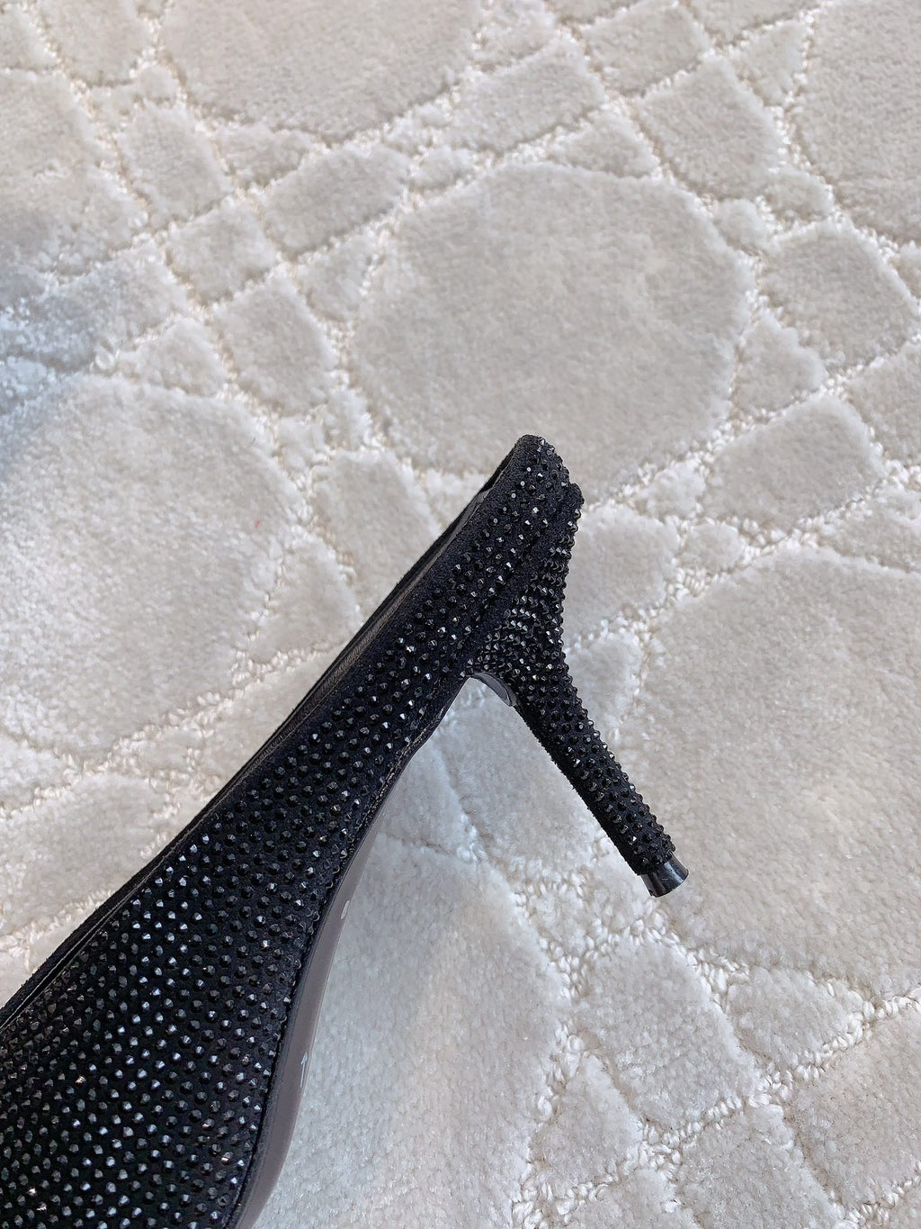 Black Balenciaga rhinestone stiletto mule heel detail, side view