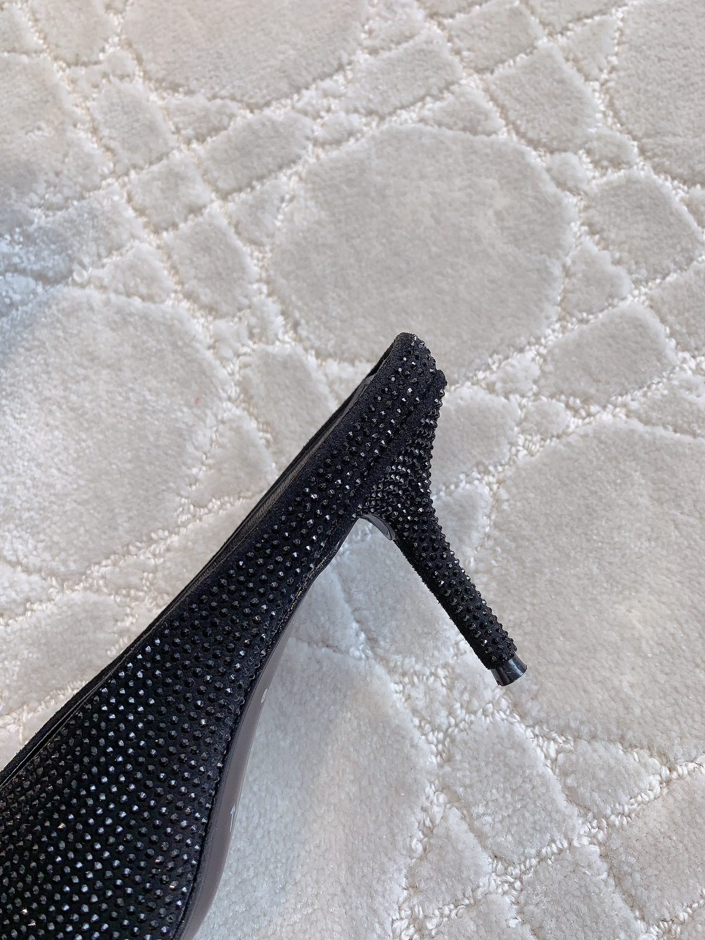 Black Balenciaga rhinestone stiletto mule heel detail, side view