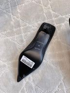 Black Balenciaga slip-on mule with pointed toe and brand logo, top view