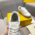 White unisex sneaker tongue and heel lining with Fendi logo labels.