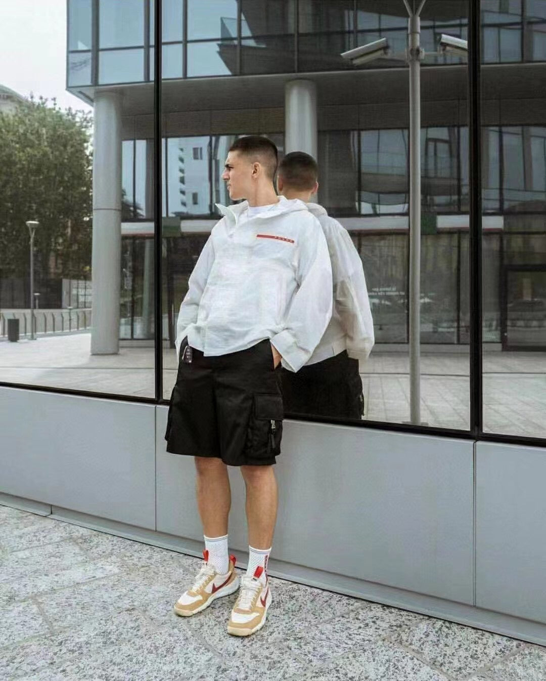 Black cargo shorts from back view with cargo pocket details