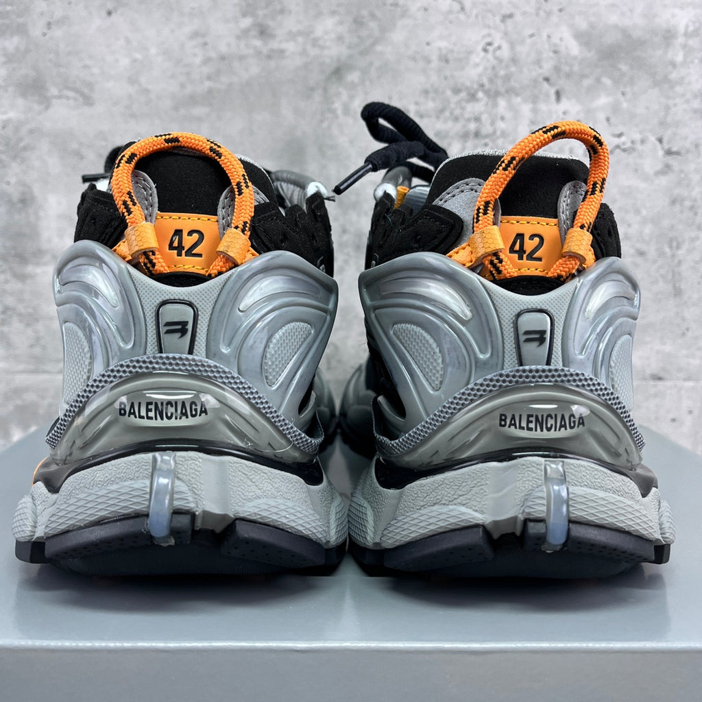 Balenciaga unisex sneakers rear view with black uppers and silver heel sections