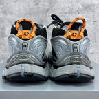 Balenciaga unisex sneakers rear view with black uppers and silver heel sections