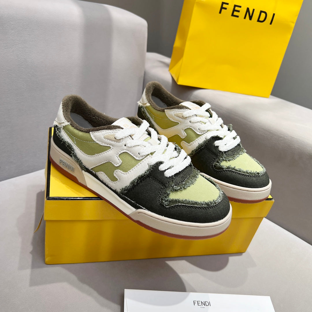 Fendi unisex sneakers with white laces, olive and dark green panels, and low gum sole