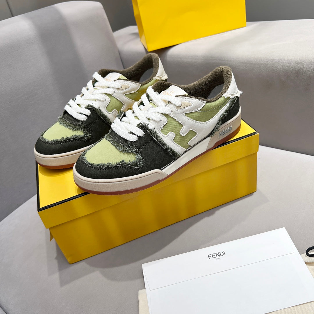 Fendi unisex sneakers pair on box, white laces, olive and dark green uppers, gum sole