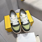 Fendi unisex sneakers front pair view on box, white laces with olive and black uppers