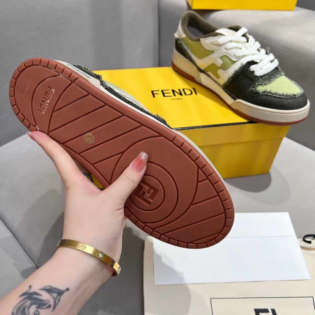 Fendi unisex sneaker outsole view, brown rubber tread with logo mark