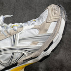 Balenciaga unisex sneakers side profile, white and gray panels with PUMA logo