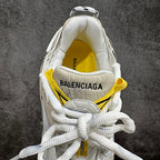 Balenciaga unisex sneakers interior view, white sockliner with yellow trim and BALENCIAGA text