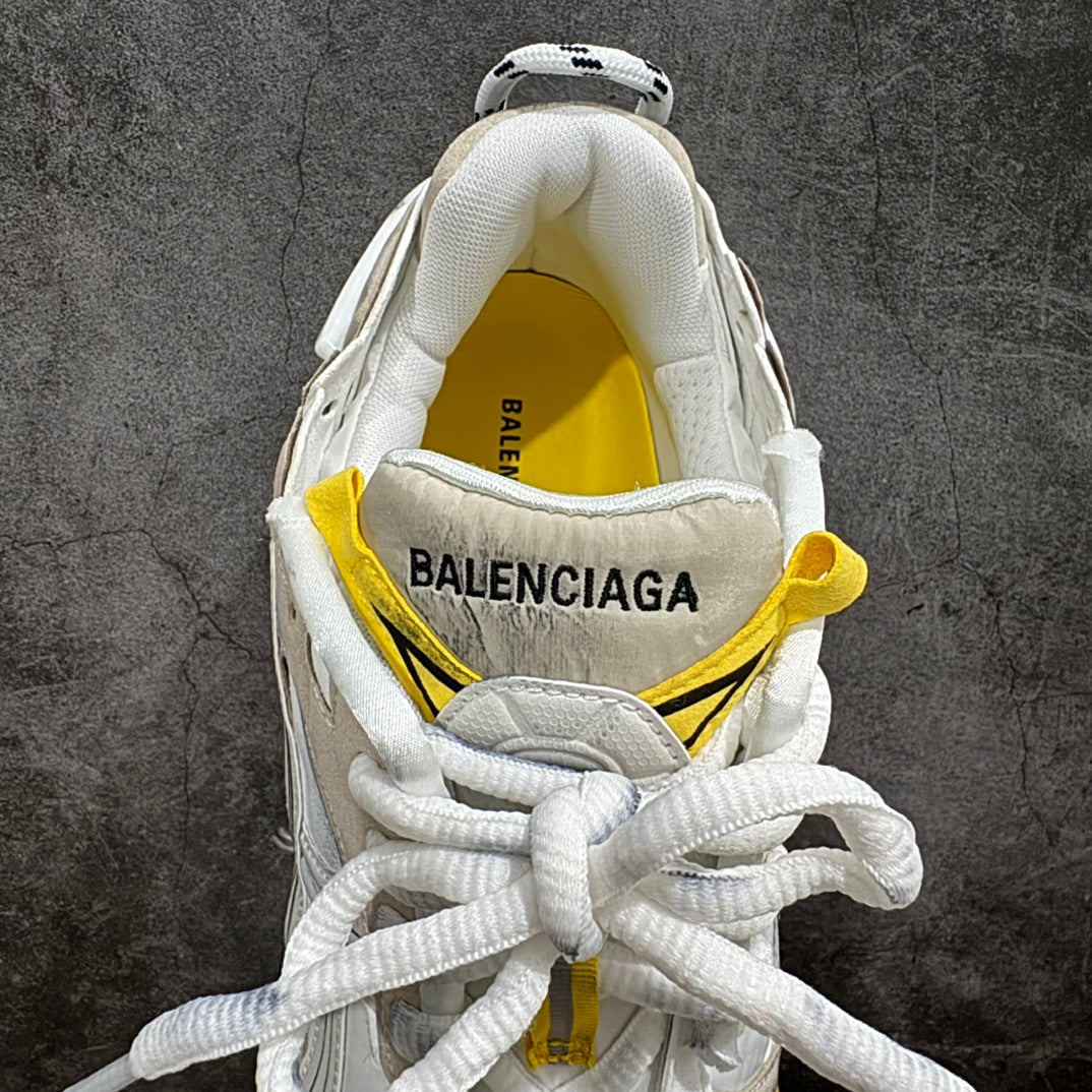 Balenciaga unisex sneakers interior view, white sockliner with yellow trim and BALENCIAGA text