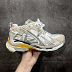 Balenciaga unisex sneakers, white and gray with yellow trim, lace-up design