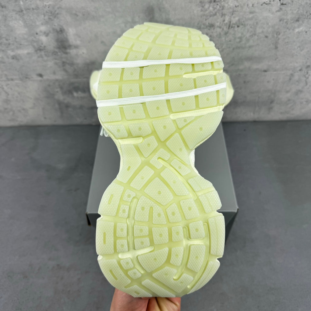 Light green rubber outsole with tread pattern, viewed from the bottom