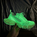Neon green lace-up sneakers with textured uppers and chunky sole