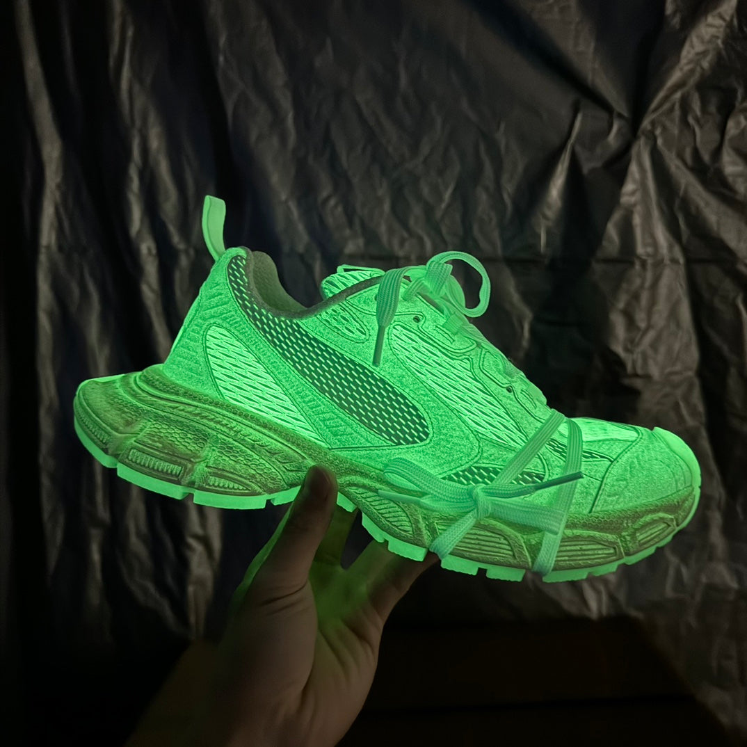 Neon green lace-up sneakers with textured uppers and chunky sole