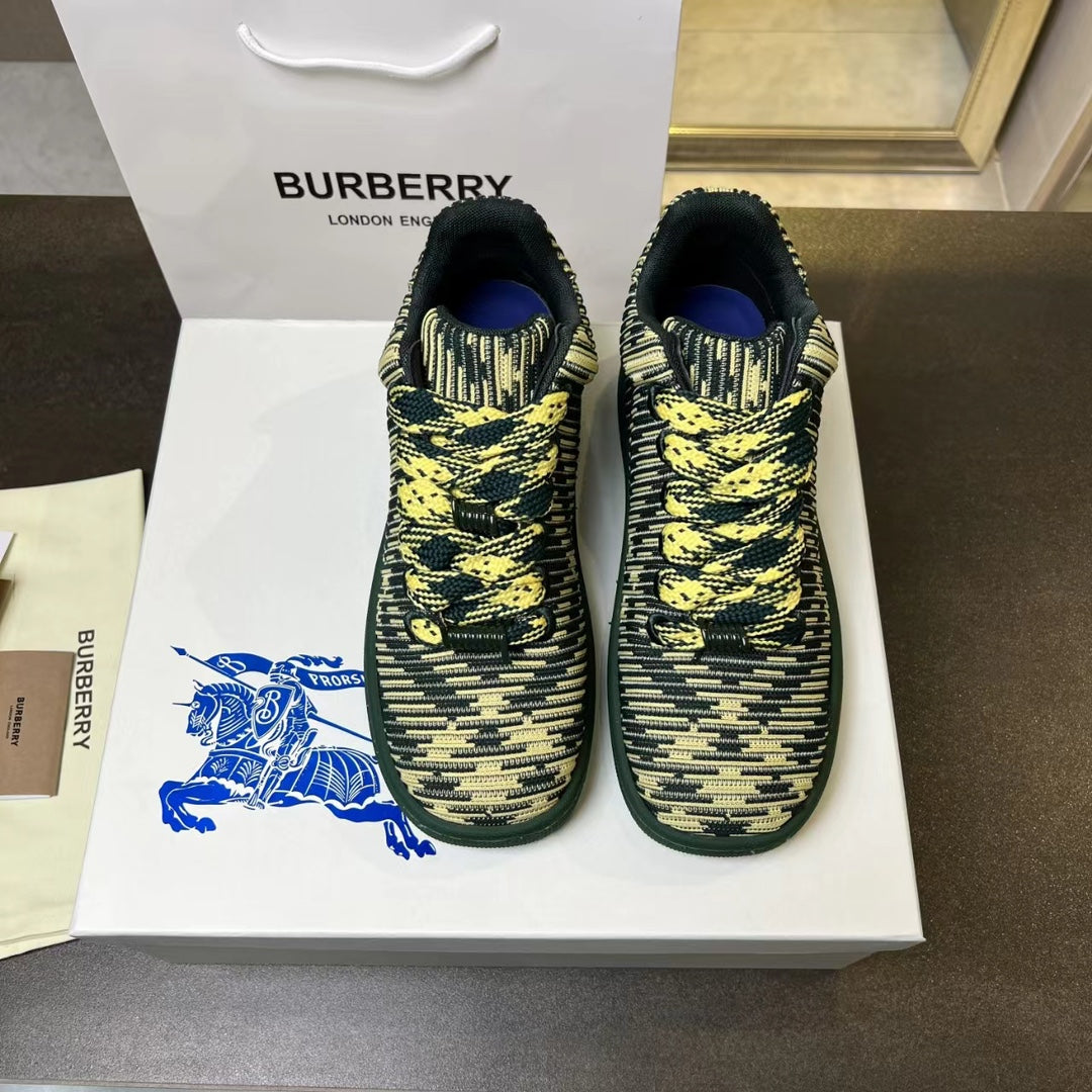 Burberry knit sneakers in dark green with yellow pattern, shown side-by-side
