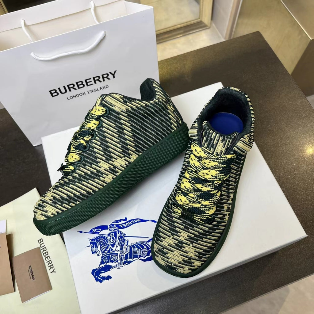 Pair of Burberry knit sneakers in dark green with yellow pattern, in a box