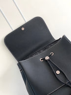 Dior leather backpack open front with front flap panel and strap hardware