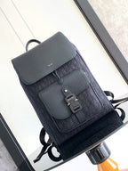 Dior men’s monogram backpack with front flap, magnetic buckle, and adjustable straps