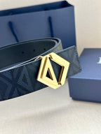Dior belt close-up: dark patterned strap with gold-tone LV buckle and studs