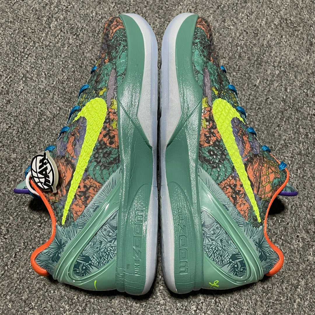 Nike Zoom Kobe 6 shoe backs with green heel panels, colorful print uppers, and blue laces