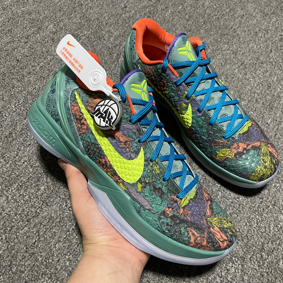 Nike Zoom Kobe 6 sneakers with green base, blue laces, neon-yellow accents, and reptile print