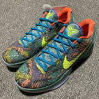 Nike Zoom Kobe 6 sneakers with green upper, blue laces, neon-yellow Swoosh, and orange lining