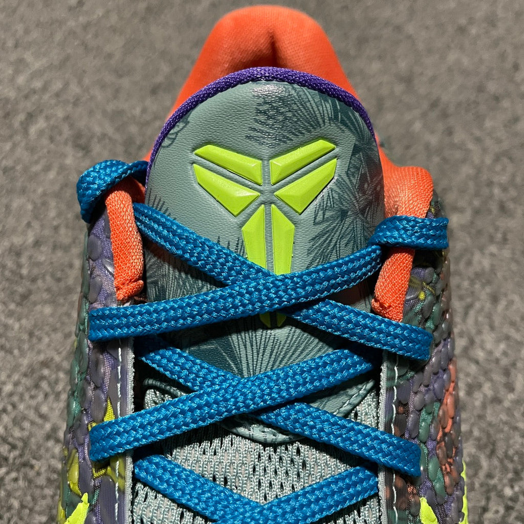 Nike Zoom Kobe 6 tongue and laces with neon-yellow logo and multicolor reptile-textured upper