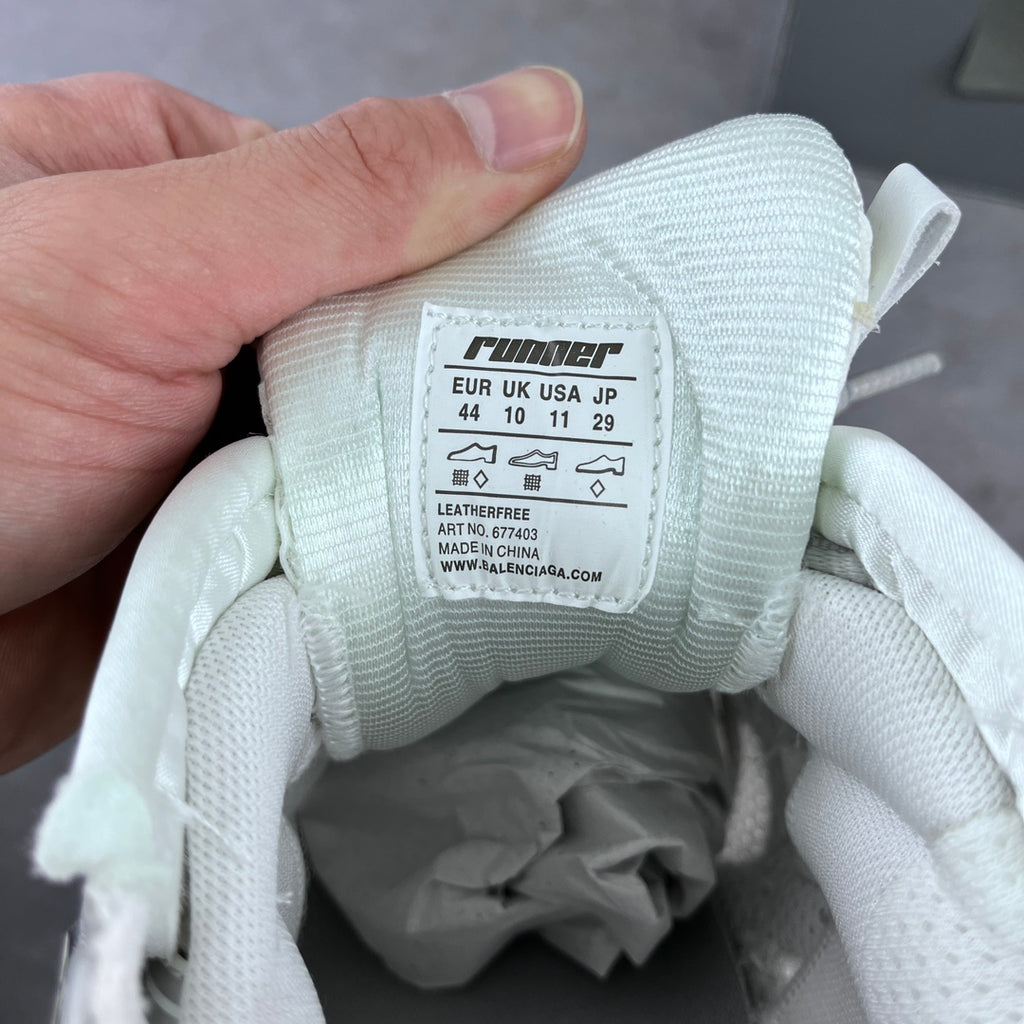 Balenciaga unisex sneakers with inner size label on the knit tongue lining.