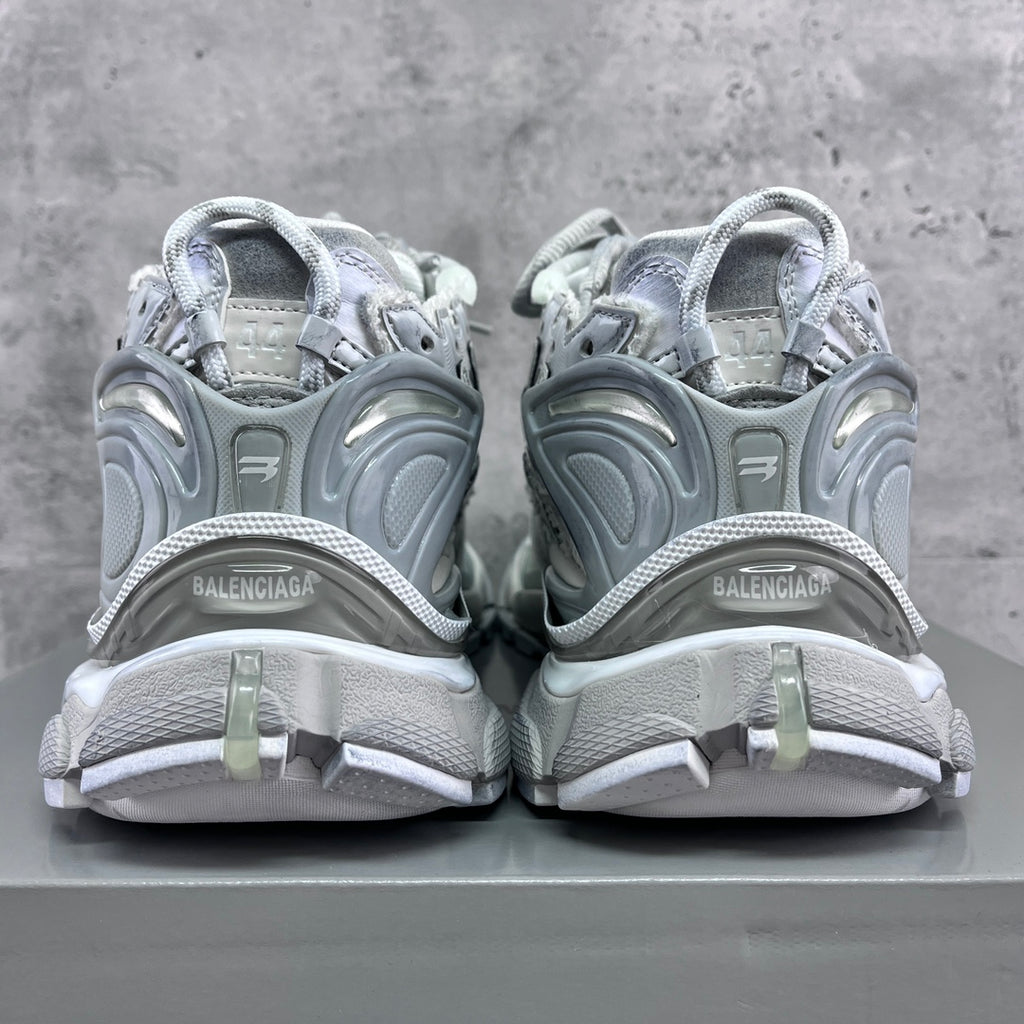 Balenciaga unisex sneakers back view with heel tabs and cushioned collar.