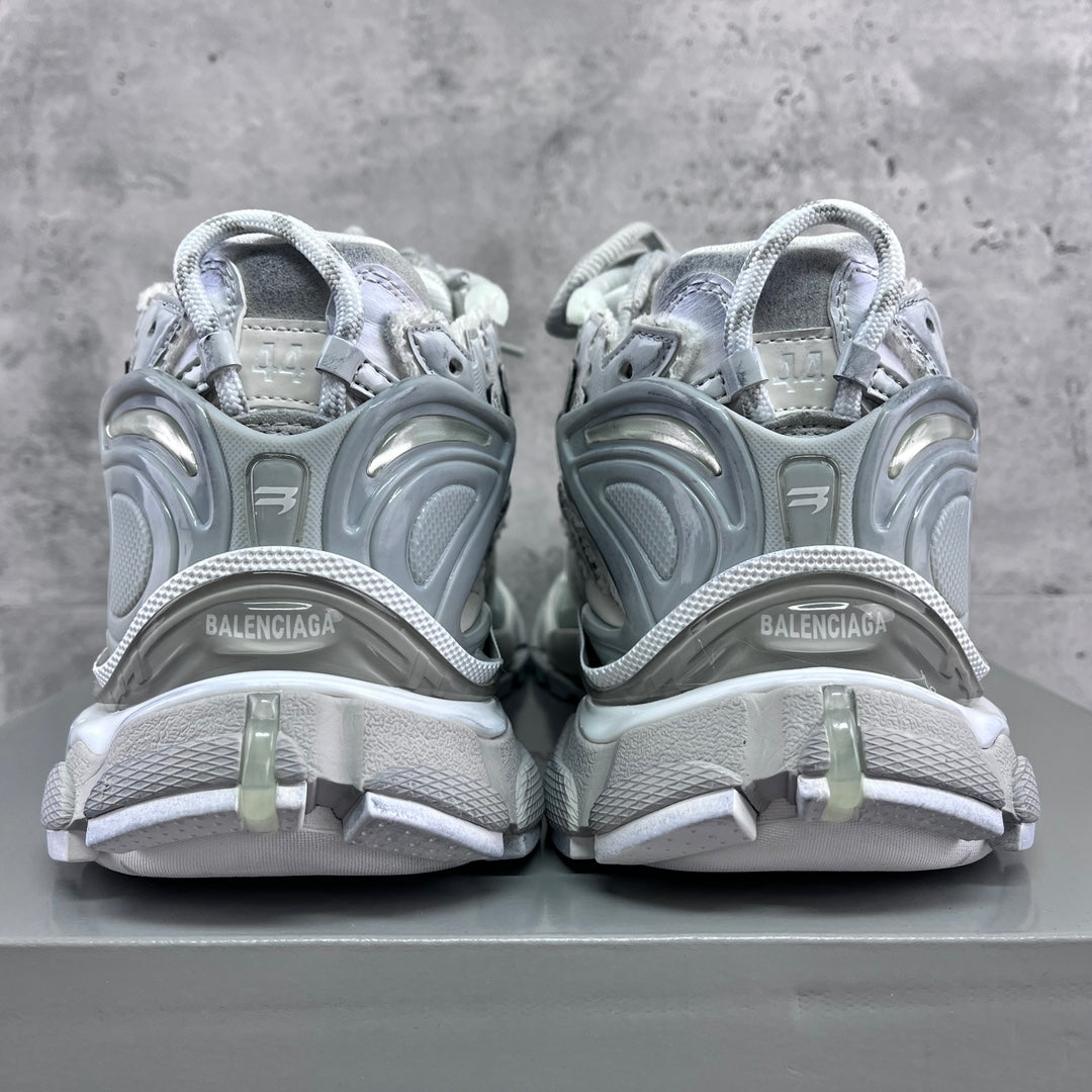 Balenciaga unisex sneakers back view with heel tabs and cushioned collar.